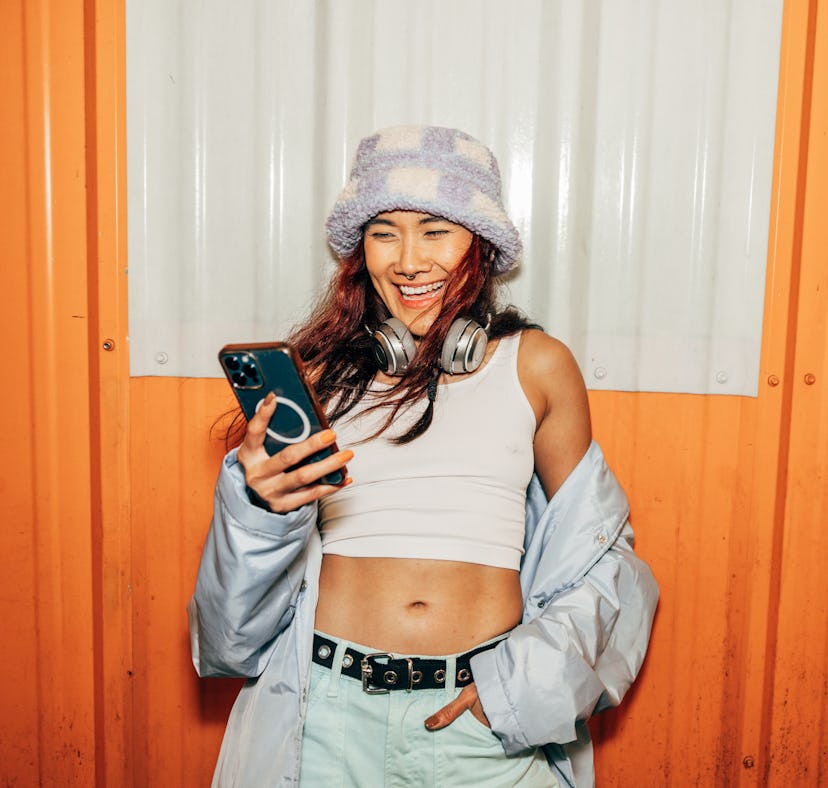 A woman choosing 2022 Instagram Recap captions to post her end-of-the-year video to Insta.