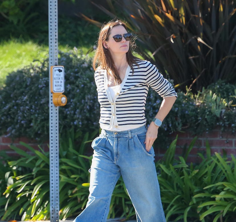 Jennifer Garner wearing a striped cardigan sweater.