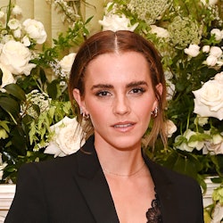 Emma Watson messy bun and fluffy eyebrows at the British Vogue and Tiffany & Co. Fashion and Film Pa...