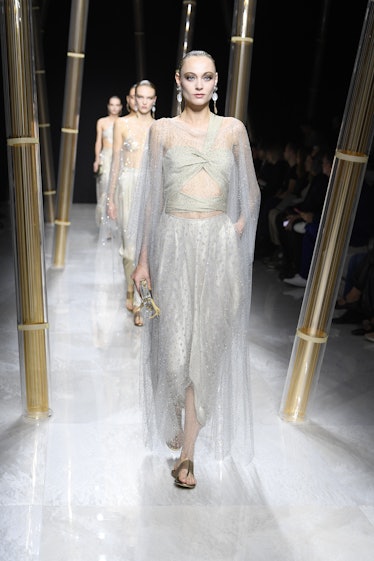 Silver and sequins on the runway at Giorgio Armani RTW Spring/Summer 2023 fashion show.