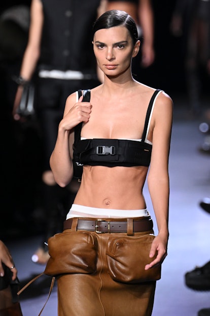 Emily Ratajkowski walks the runway during the Miu Miu Ready to Wear Spring/Summer 2023 fashion show ...