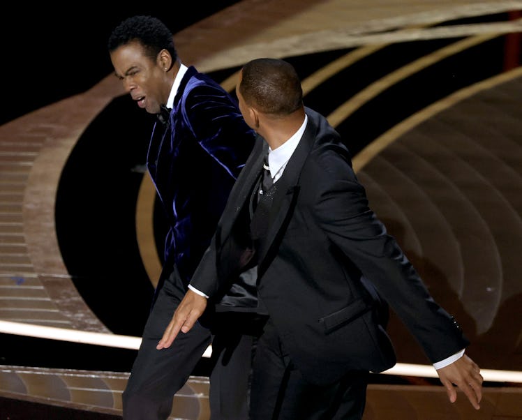 HOLLYWOOD, CALIFORNIA - MARCH 27: Will Smith appears to slap Chris Rock onstage during the 94th Annu...