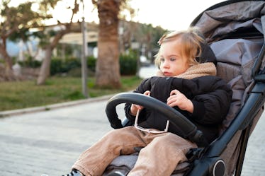 Danish baby in a stroller left on the curb of a store