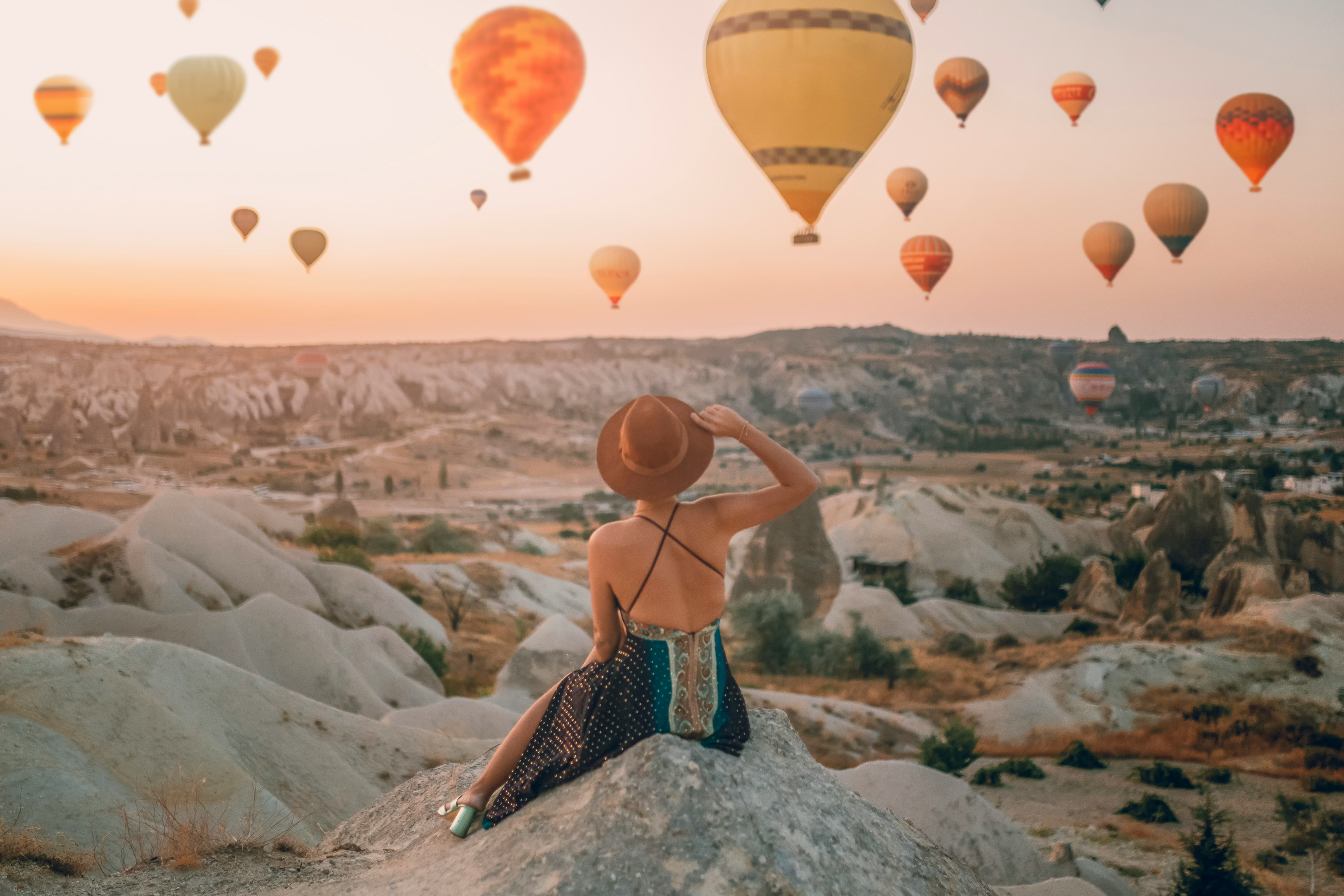 A woman in turkey finds the best solo travel destination for your zodiac sign.
