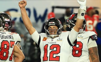 TAMPA, FLORIDA - FEBRUARY 07: Tom Brady #12 of the Tampa Bay Buccaneers reacts after defeating the K...