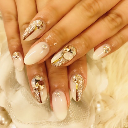A jeweled manicure is one idea for New Years Eve nails.