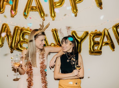 Friends at a New Year's Eve party need New Year's Eve captions to post on Instagram. 