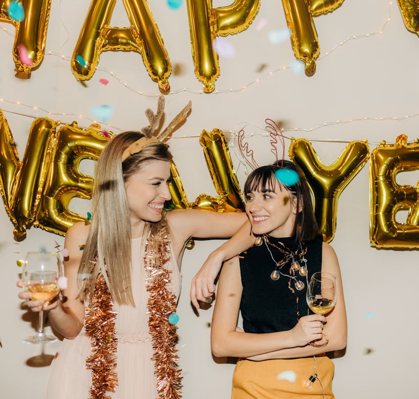 Friends at a New Year's Eve party need New Year's Eve captions to post on Instagram.
