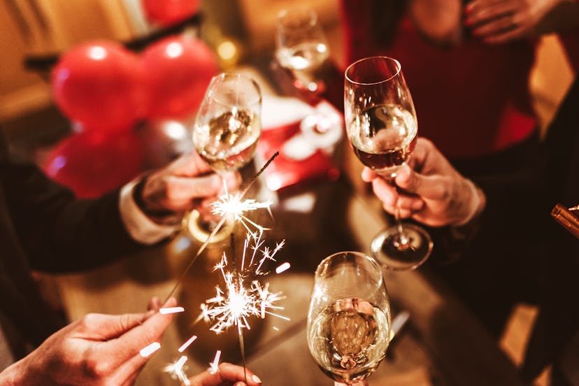 Champagne toast with sparklers, in a story about New Year's trivia questions and answers.