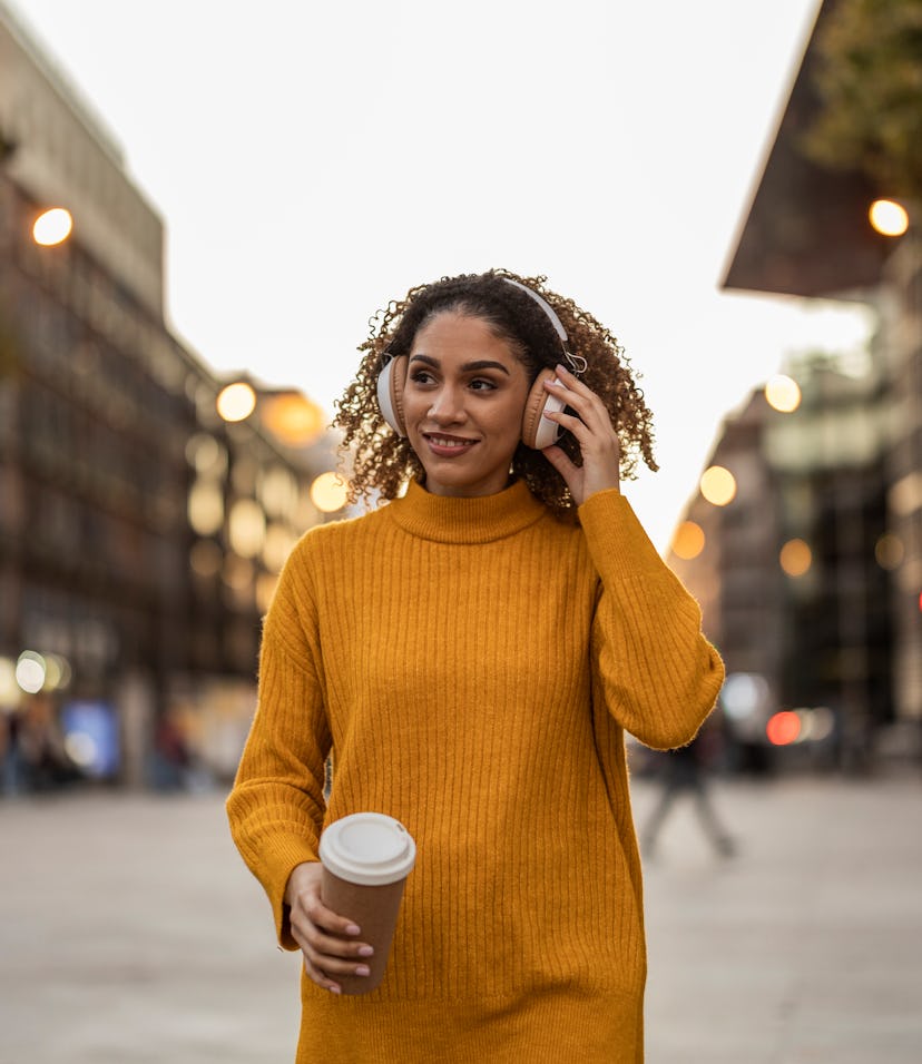 woman listening to holiday music