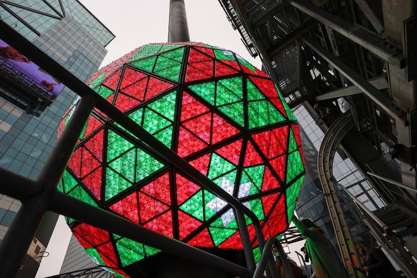 Times Square ball illuminated, in a story about New Year's trivia questions and answers.