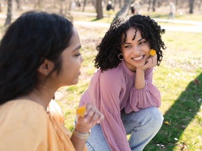 Portrait of the two female friends enjoying outdoors together during the 2023 spring equinox.