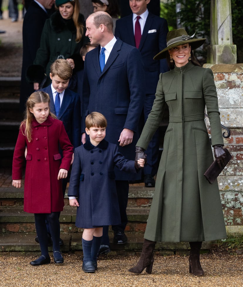 Kate Middleton wearing an olive tailored coat from Alexander McQueen for Christmas 2022.