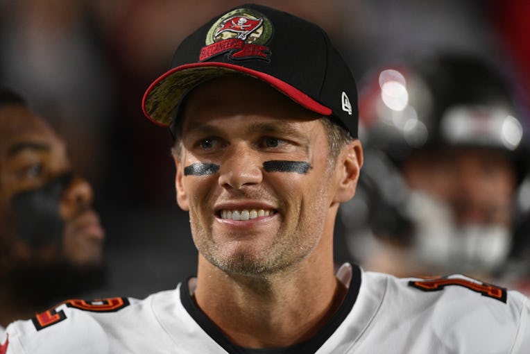 GLENDALE, ARIZONA - DECEMBER 25: Tom Brady #12 of the Tampa Bay Buccaneers prepares for a game again...