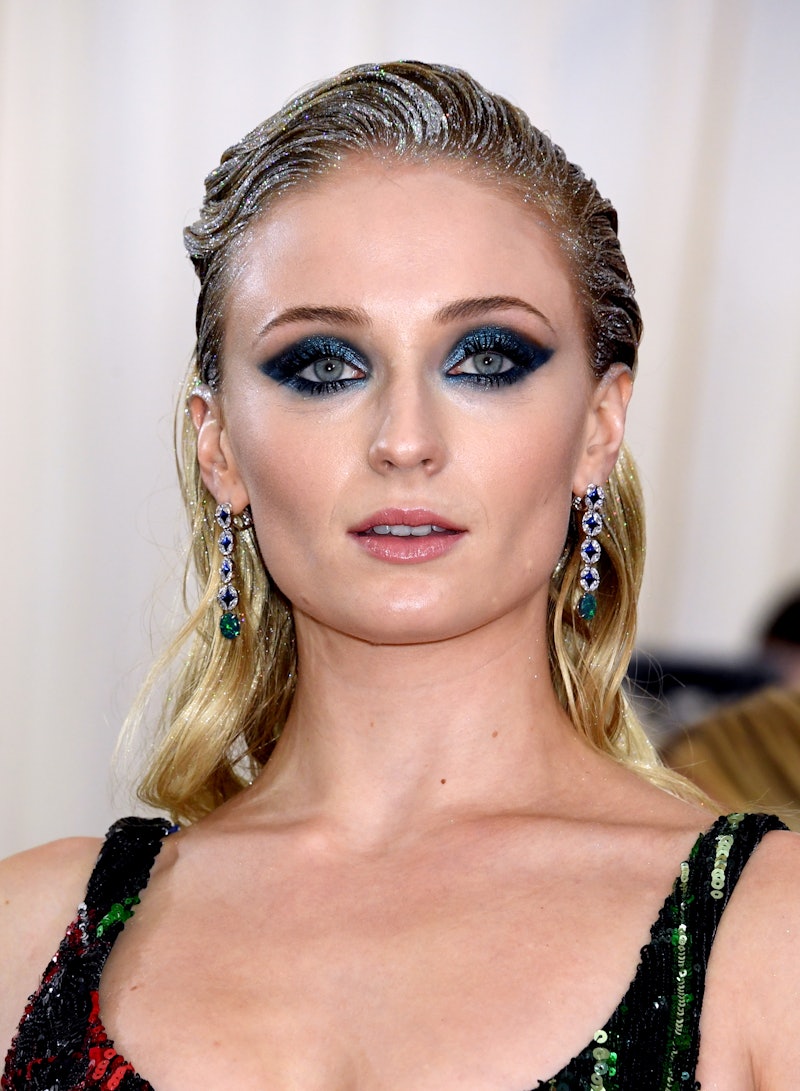 Sophie Turner at the 2019 Met Gala with glitter hair. Here are the best glitter hair sprays for recr...