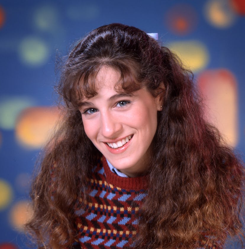 Sarah Jessica Parker young in 1982 with curly hair and bangs