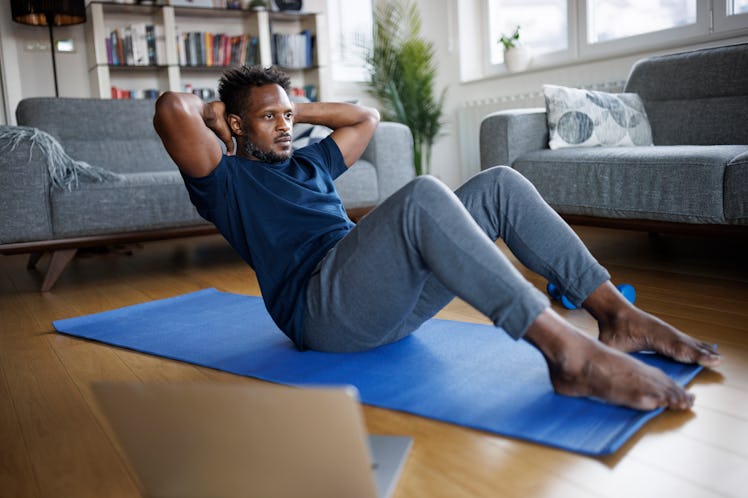 Man exercising at home