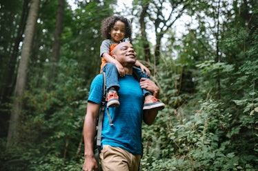 A young mixed race family spends time together outside in Washington state, enjoying the beauty of t...