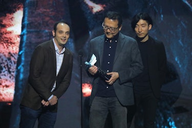 LOS ANGELES, CALIFORNIA - DECEMBER 12:  Hidetaka Miyazaki (C) accepts "The Game of The Year" award f...