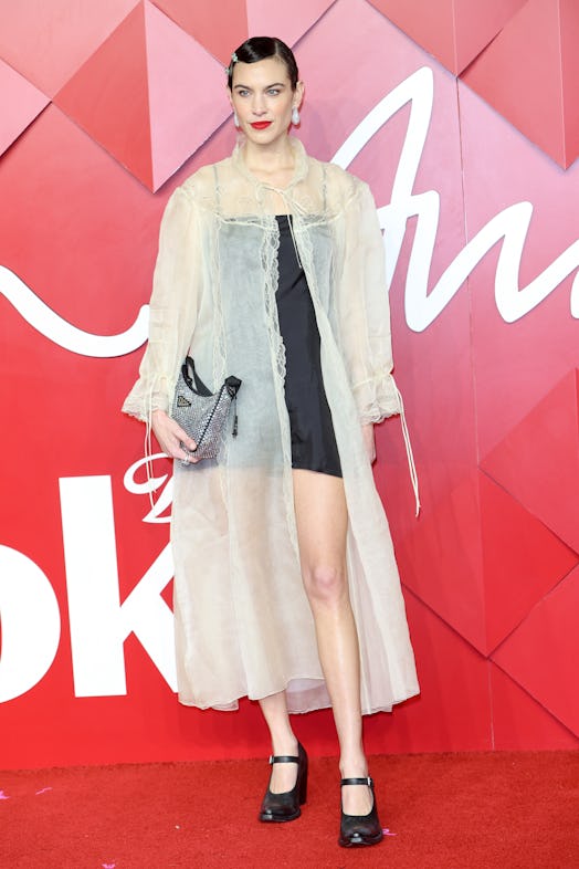 Alexa Chung wearing a Prada outfit.