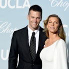 Tom Brady and Gisele Bündchen are making an effort to be solid co-parents. Here, they attend the 201...