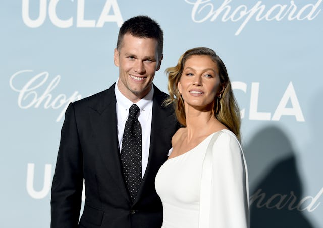 Tom Brady and Gisele Bündchen are making an effort to be solid co-parents. Here, they attend the 201...