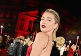 Florence Pugh wears a red Valentino dress at The Fashion Awards 2022