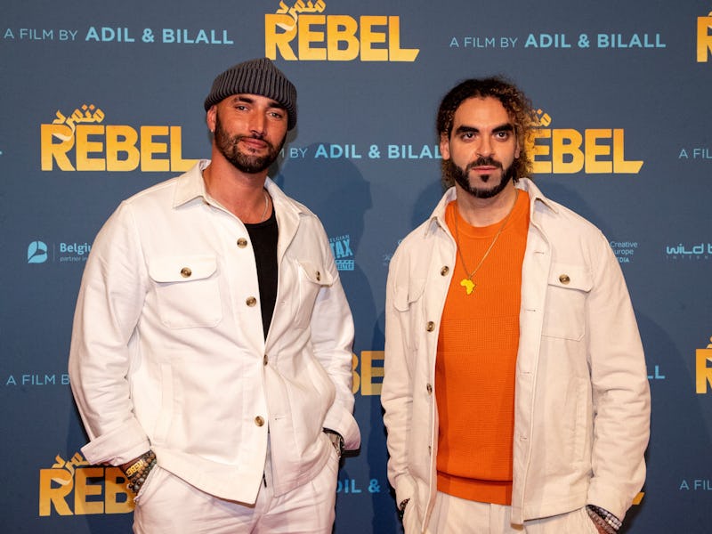 Belgian film directors Bilall Fallah (L) and Adil El Arbi pose at the premiere of the film 'Rebel',...