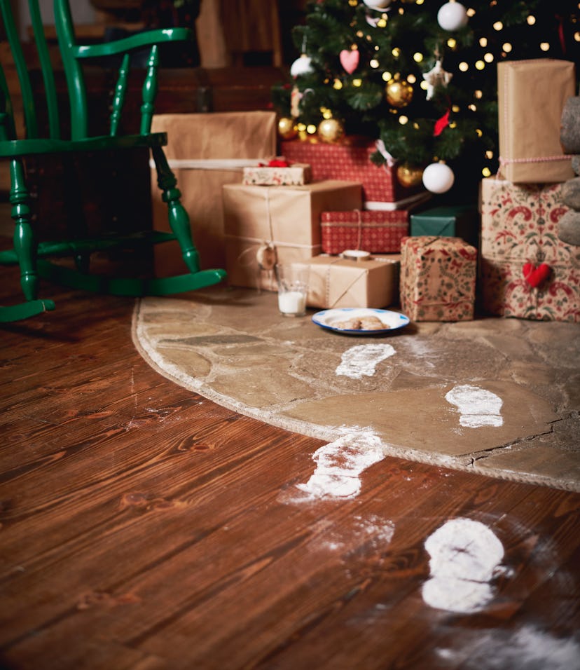 living room with santa footprints on the snow 