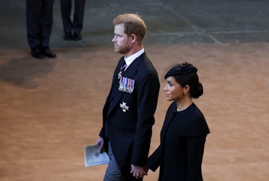 LONDON, ENGLAND - SEPTEMBER 14: Prince Harry and Meghan, Duchess of Sussex walk as procession with t...