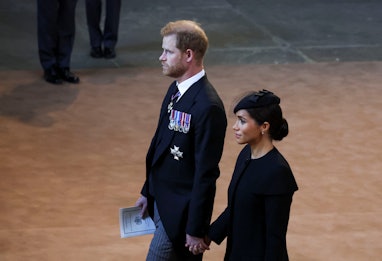 LONDON, ENGLAND - SEPTEMBER 14: Prince Harry and Meghan, Duchess of Sussex walk as procession with t...