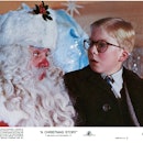 Peter Billingsley sits on Santa's lap in a scene from the film 'A Christmas Story', 1983. (Photo by ...