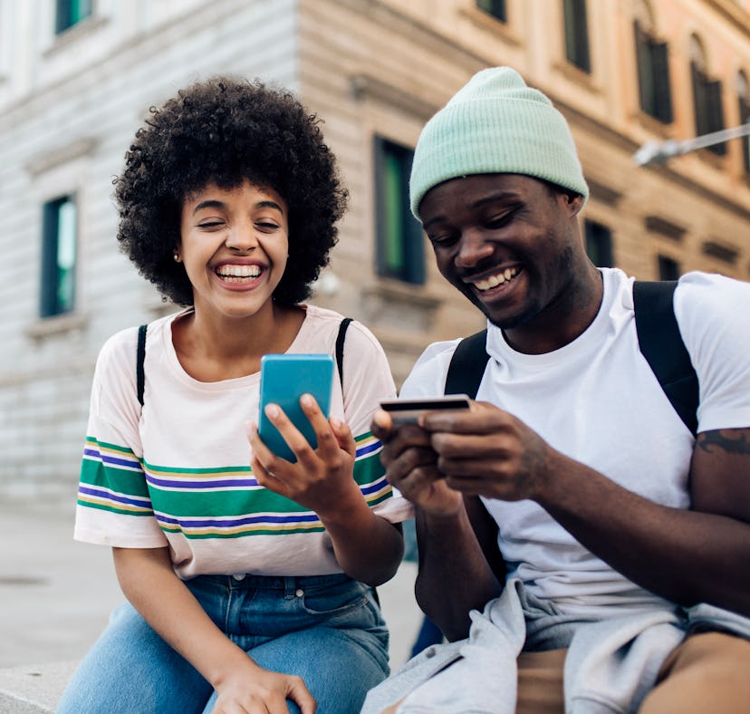 Friends show each other how to do the MyHeritage AI trend on TikTok and Instagram with the AI Time M...