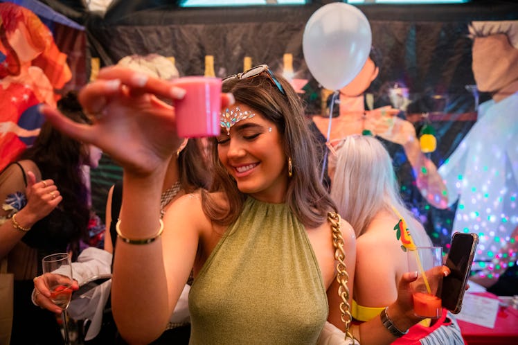A woman throws a themed bachelorette party as part of the 2023 bachelorette party trends. 
