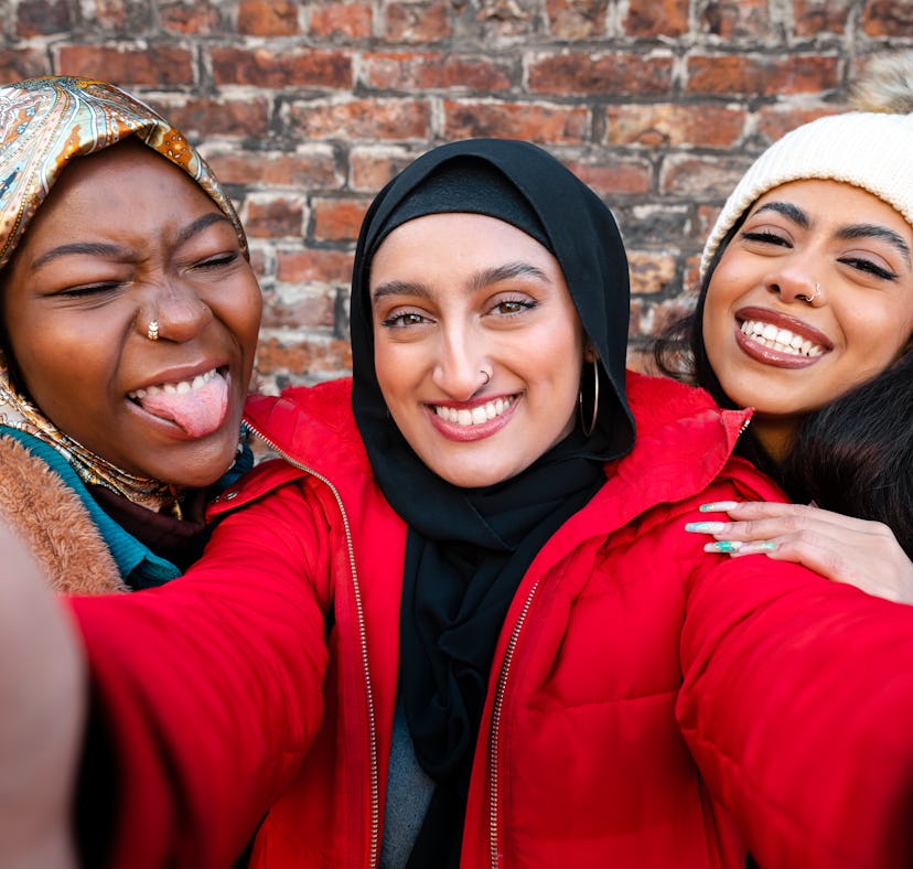 The winter solstice will affect a few zodiac signs the most: like these women taking a selfie shot w...