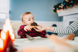 Baby boy eats donuts but is Dunkin' open on Christmas 2022?