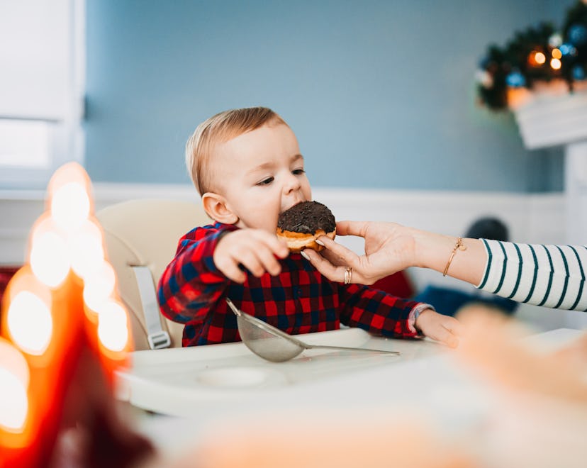 Baby boy eats donuts but is Dunkin' open on Christmas 2022?