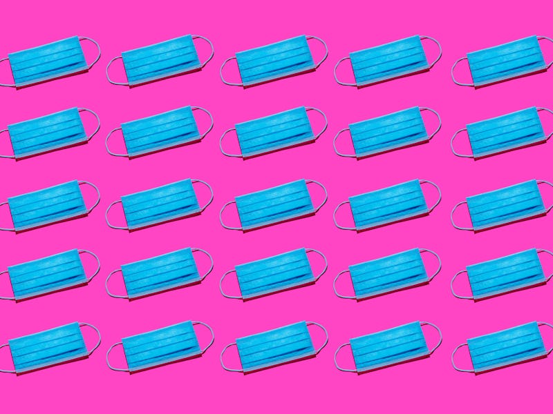 Medical pattern from antibacterial protective masks on a pink background. Concept Of Air Pollution, ...