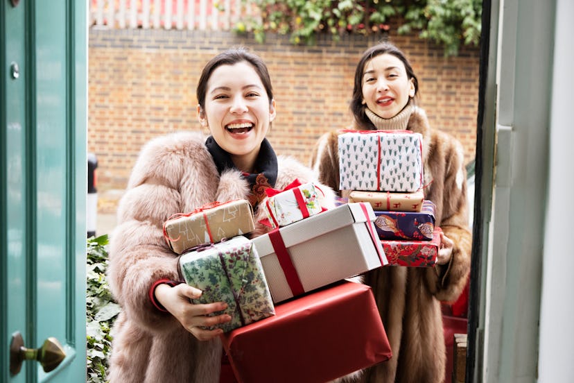 women bringing gifts in a list of perfect gift captions for instagram