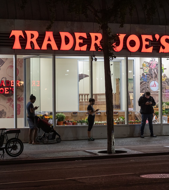 exterior of trader joe's store at night in an article about trader joe's 2022 christmas hours