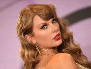 US singer Taylor Swift poses in the press room after winning six awards at the 50th Annual American ...