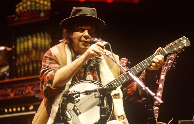 Neil Young performs during Neil Young's Annual Bridge School benefit at Shoreline Amphitheatre on Oc...