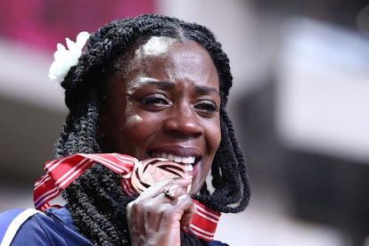 TOPSHOT - New bronze medallist USA's Alysia Johnson-Montano poses on the podium during the medal cer...