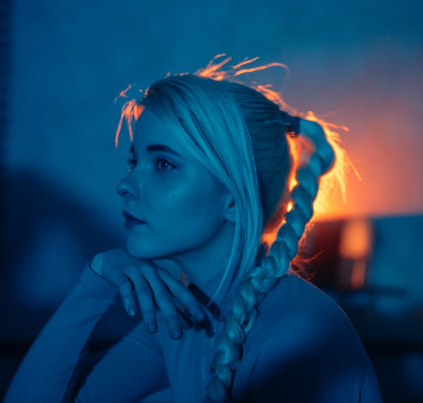 Young woman staring into the distance, knowing her unlucky zodiac sign will have the worst week of F...