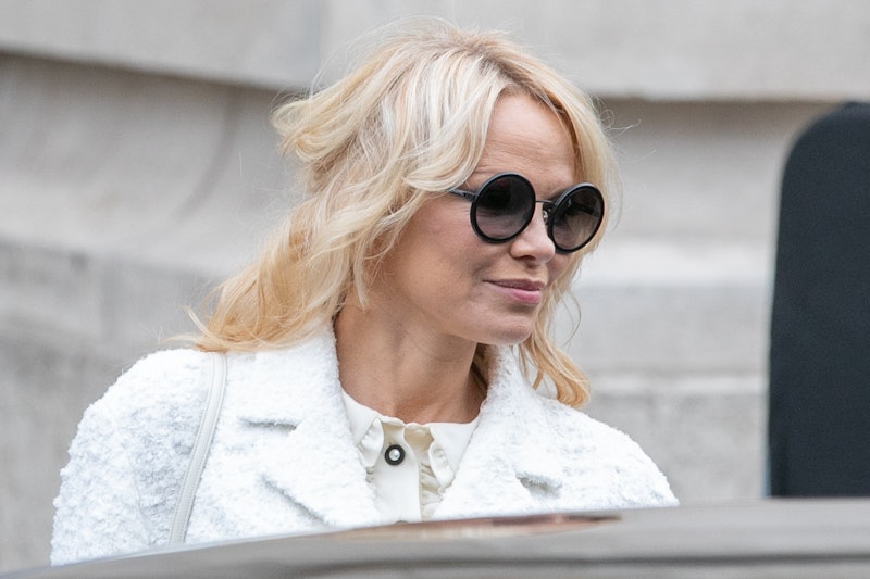 Actress Pamela Anderson is seen leaving the Chanel fashion show on October 2, 2018 in Paris, France.