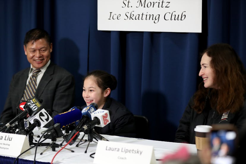 OAKLAND, CALIFORNIA - JANUARY 31: Alysa Liu, 13, of Richmond, center, along with her father Arthur L...