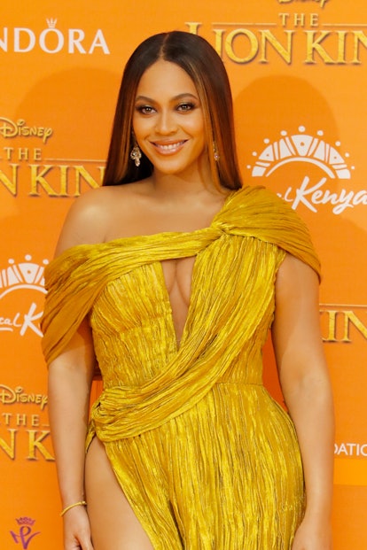 Beyonce Knowles-Carter at the Premiere of "The Lion King" in London, England wearing auburn blonde h...