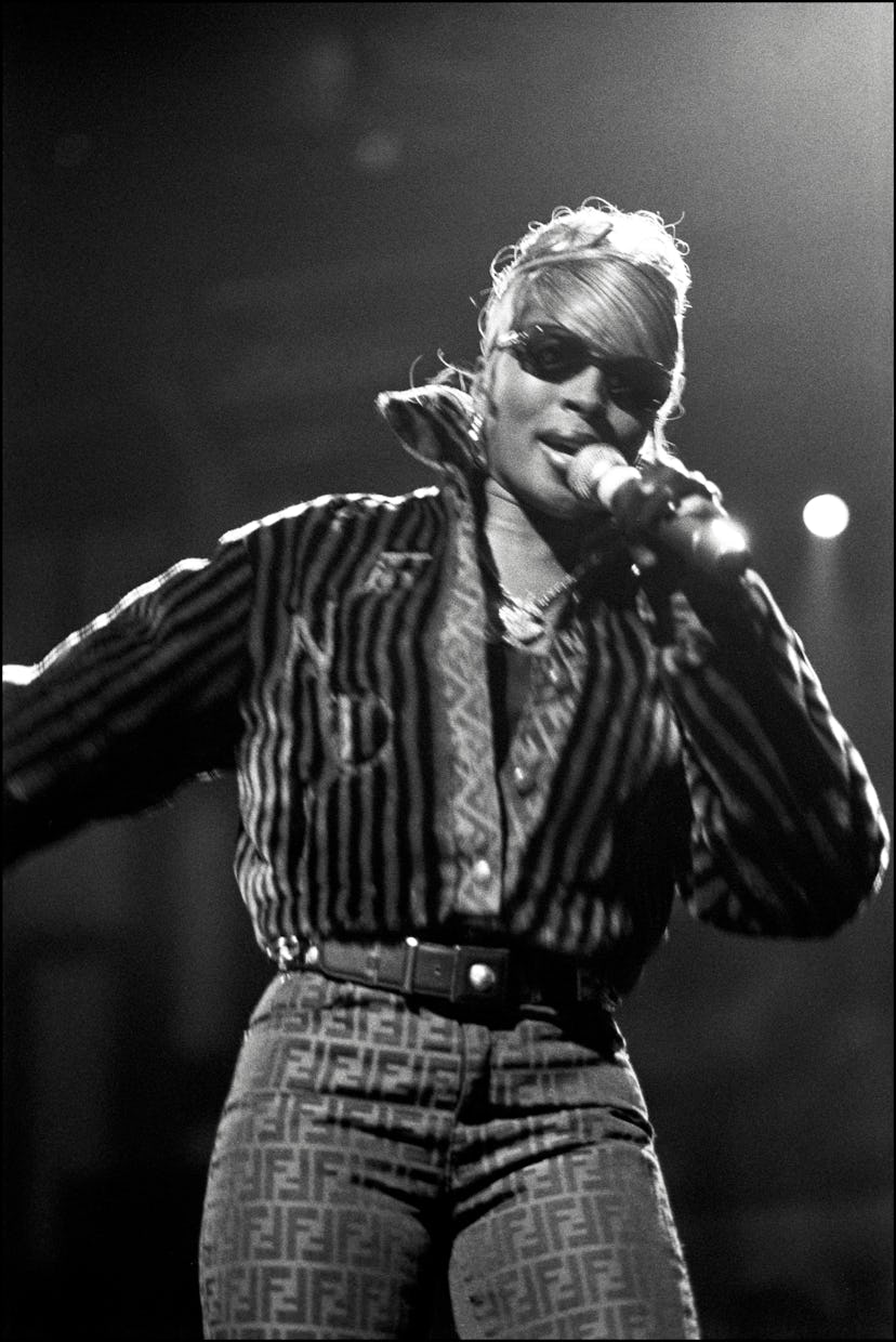 Mary J. Blige performing in Fendi pants at a concert in 1995.