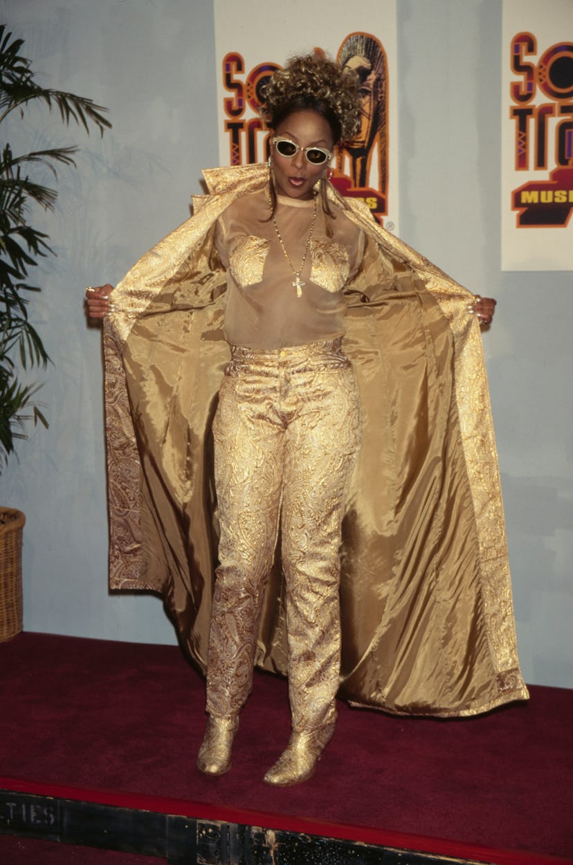 Mary J. Blige at the 11th Soul Train Music Awards in an all gold outfit. 