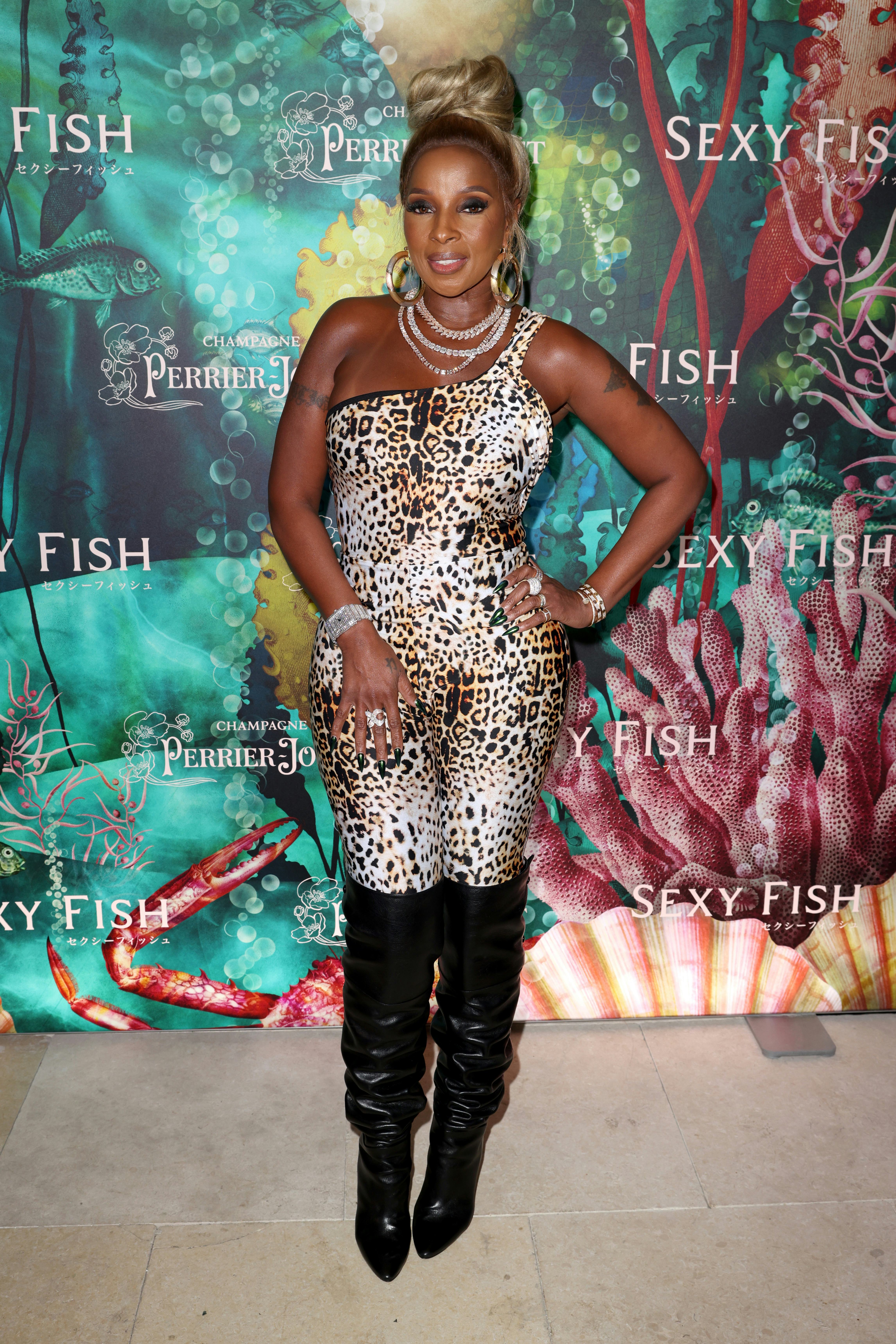Mary J. Blige in a leopard jumpsuit.